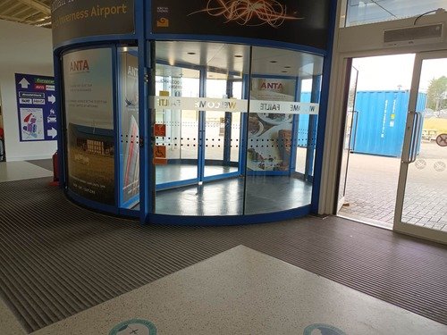2022-12 Inverness Airport Step 1 small Inverness Airport Exit Door